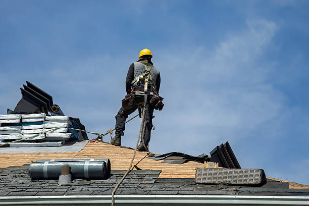 Professional Gutter Installation technician working in Belfair, WA